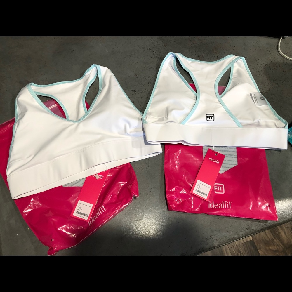 Two white sports bras